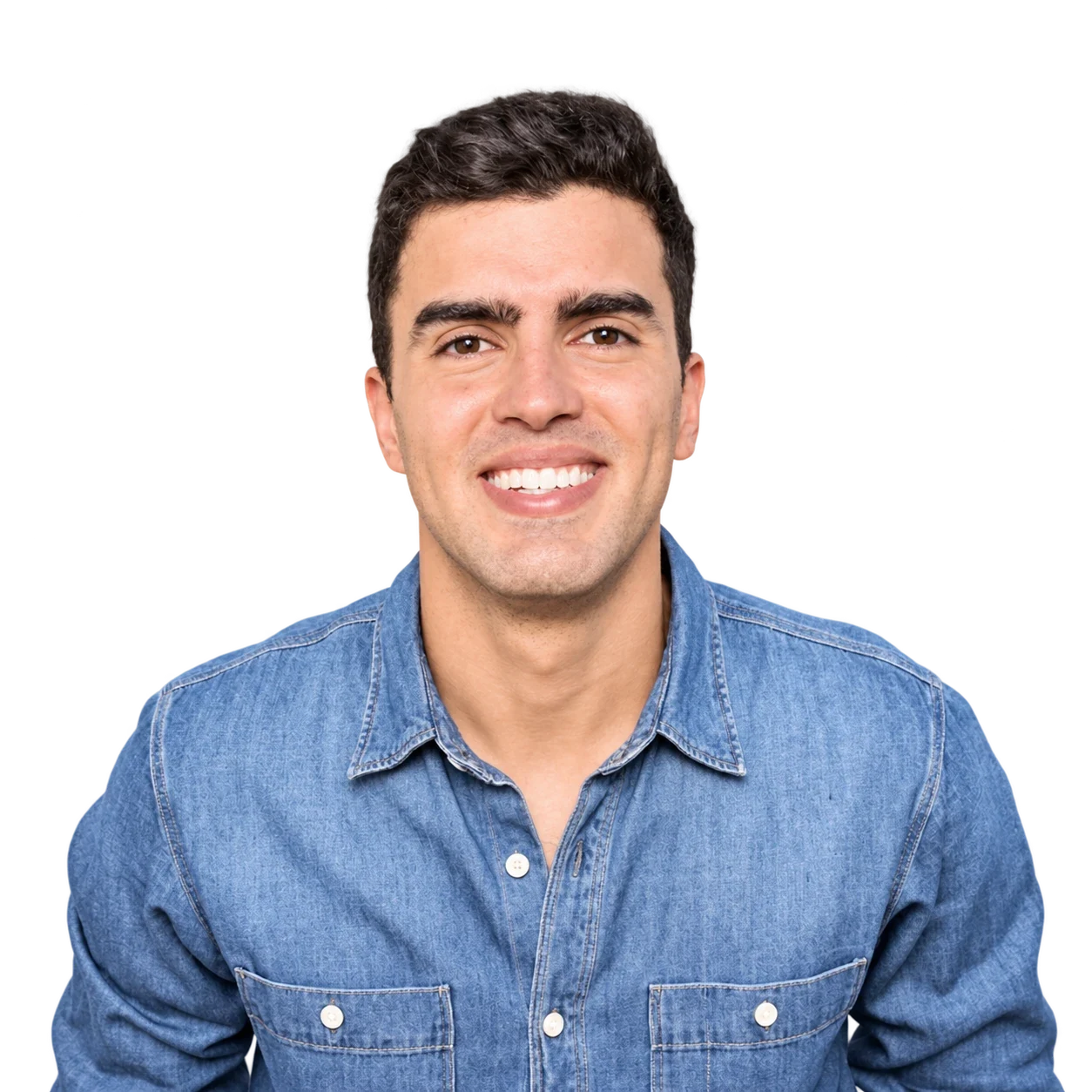 Gabriel De Almeida smiling in a denim shirt